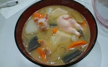 日本现“真猪料理” 制作逼真食客多难接受